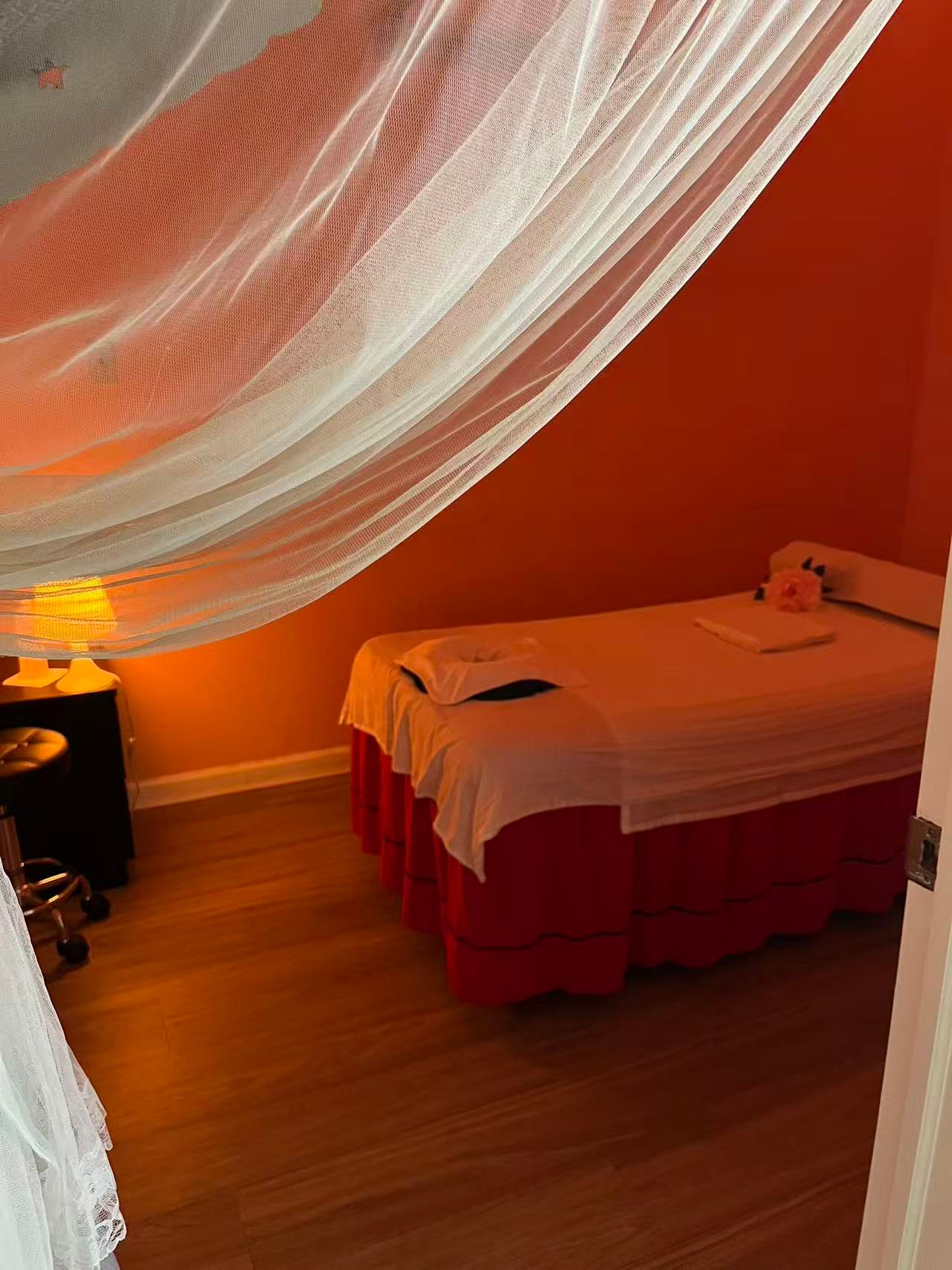 Warm canopy massage treatment room at Amazing Massage